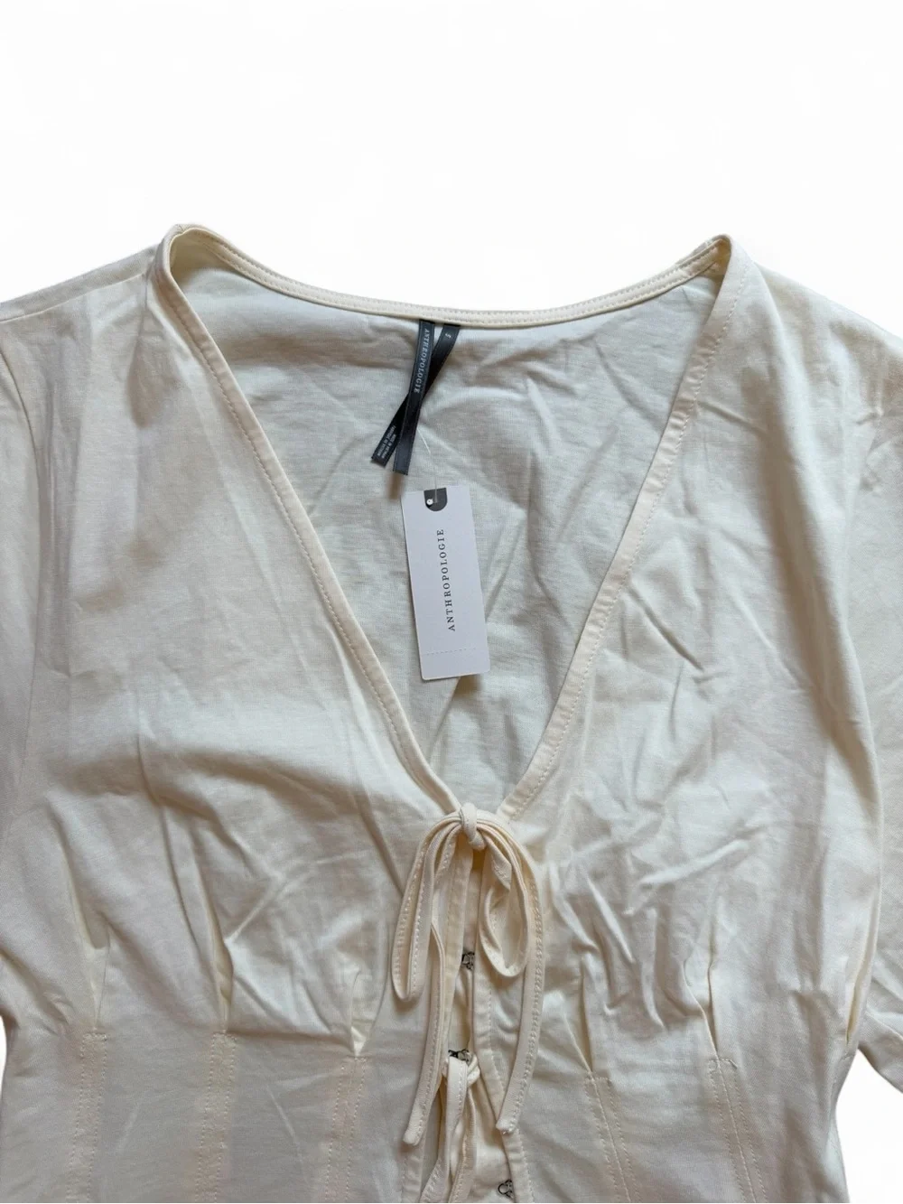 Anthropologie Cream Lace-Up V-Neck Peplum Blouse